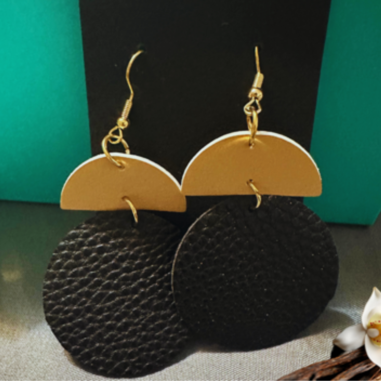 These chic accessories effortlessly elevate your look with their sleek design. The classic round shape, combined with a trendy drop, adds a touch of sophistication to any outfit